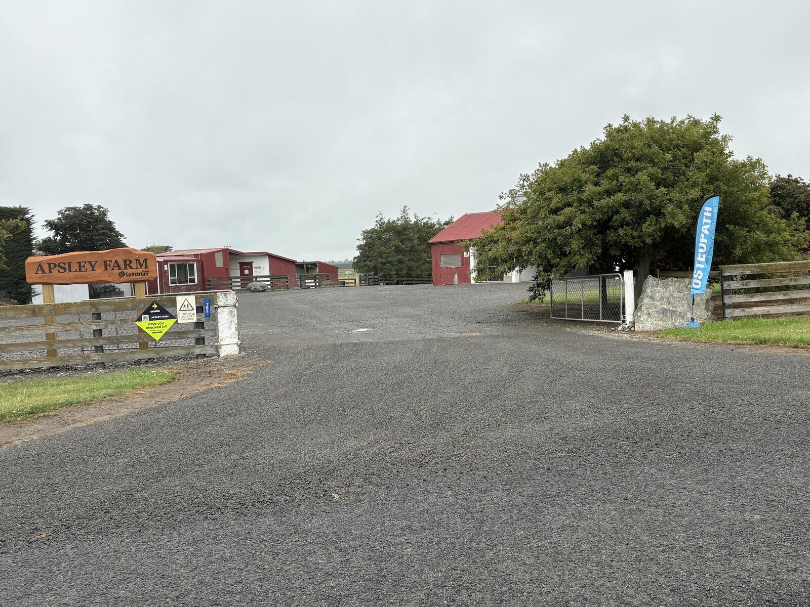 Apsley Farm clinic entrance with the Osteopath flag